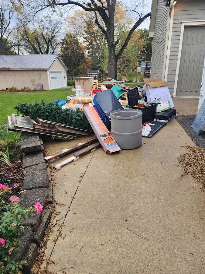Dumpster being loaded with debris for Commercial Dumpster Rental in Mount Gilead